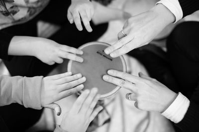 High angle view of people holding hands