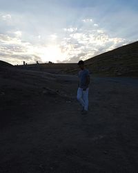 Woman standing on field