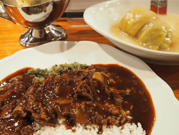 Close-up of soup served on table