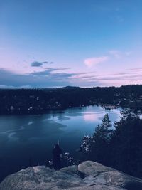 Scenic view of lake against sky during sunset