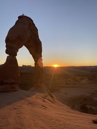 Delicate arch formation in arches national park during sunset