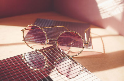 Close-up of eyeglasses on table