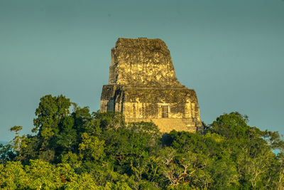 Low angle view of old building against sky