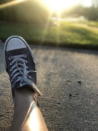 Low section of person on road