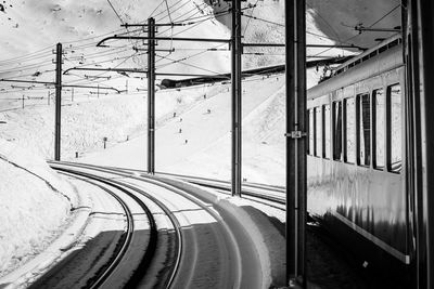 Train on railroad track against sky