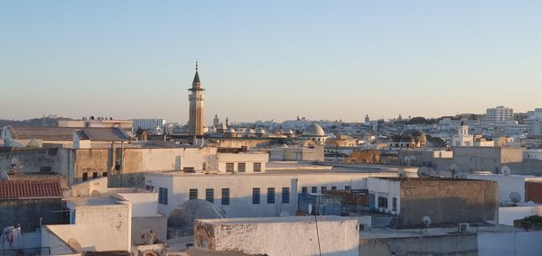 Cityscape against clear sky