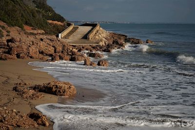 Scenic view of beach against sky