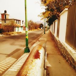 Road in city against sky