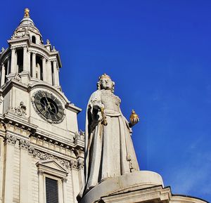 Low angle view of church against blue sky