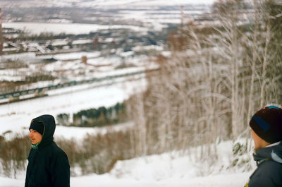 People standing outdoors during winter