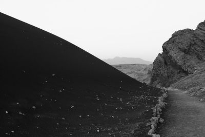 Scenic view of mountains against clear sky