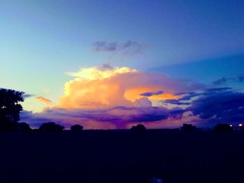 Scenic view of silhouette landscape against sky during sunset