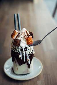 Close-up of ice cream cone on table