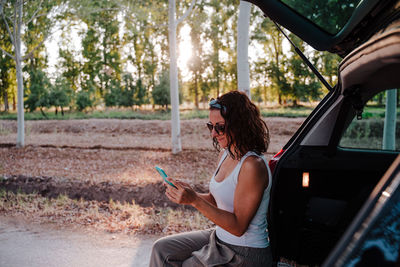 Woman sitting in car