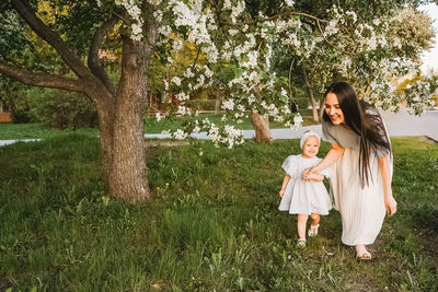 Young woman standing on field