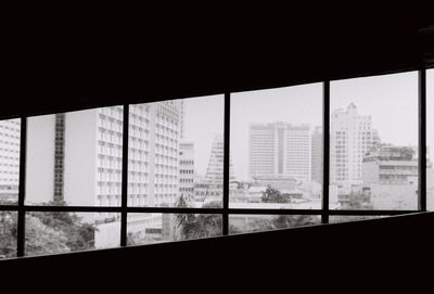 Cityscape seen through window