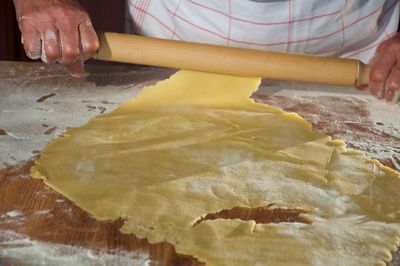 Close-up of man preparing food