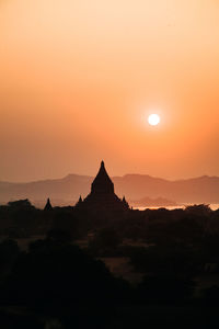 Silhouette of temple during sunset