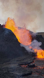 Scenic view of volcanic mountain during sunset