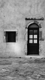 Closed door of abandoned house