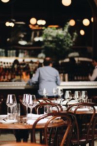 Rear view of man sitting in restaurant