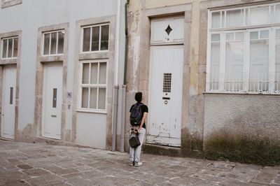 Rear view of man walking outdoors