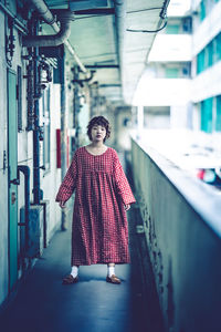 Portrait of woman standing outdoors