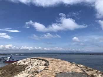 Scenic view of beach against sky