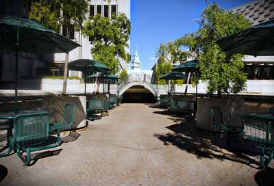 Empty alley amidst buildings in city