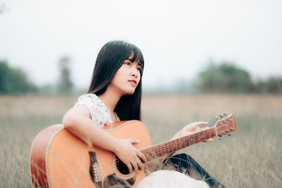 Young woman on field