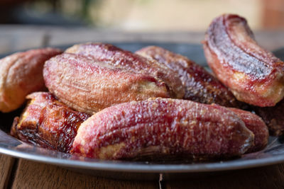 Close-up of meat on barbecue grill