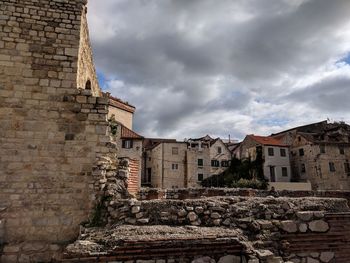 Old buildings against sky