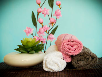 Close-up of pink flowers on table