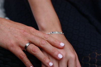 Close-up of hand holding hands