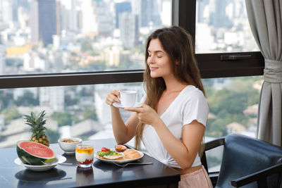 Young woman using mobile phone