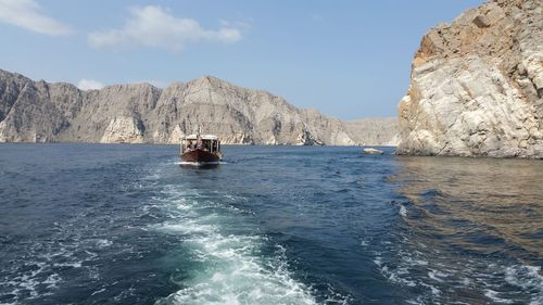 Boat in sea against sky