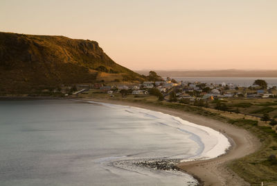 Scenic view of beach against clear sky