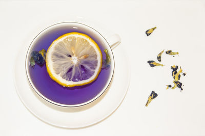 High angle view of lemon against white background