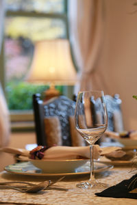 Close-up of wineglass on table