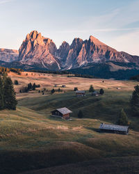 Scenic view of landscape and mountains against sky