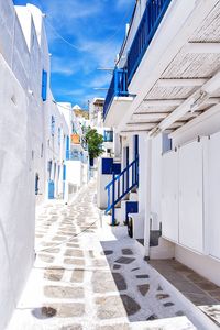 Road amidst buildings at mykonos