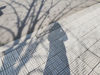 High angle view of shadow on sand