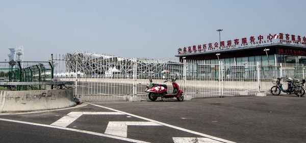 People on motorcycle against clear sky