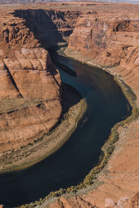 High angle view of rock formations at riverbank