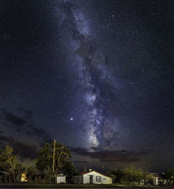 Scenic view of star field against sky at night