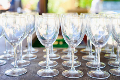 Close-up of wineglasses on table