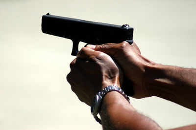 Close-up of man holding camera