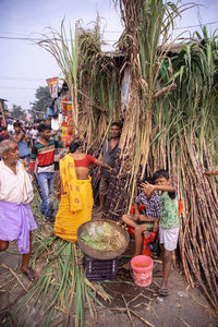 People at market stall