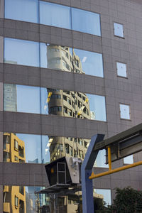 Low angle view of modern building against sky