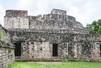 Low angle view of old ruin against sky